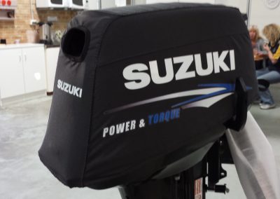 Suzuki 2 stroke vented outboard cover.